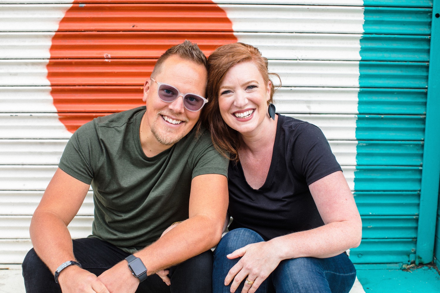 Shelly and Jason Yost smiling, leaning together